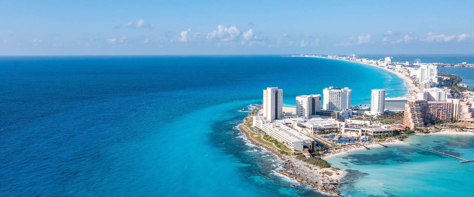 Aerial view of the luxury hotels in Cancun by the Punta Norte beach in Mexico. Luxury resorts located at the very shore of the Caribbean sea.