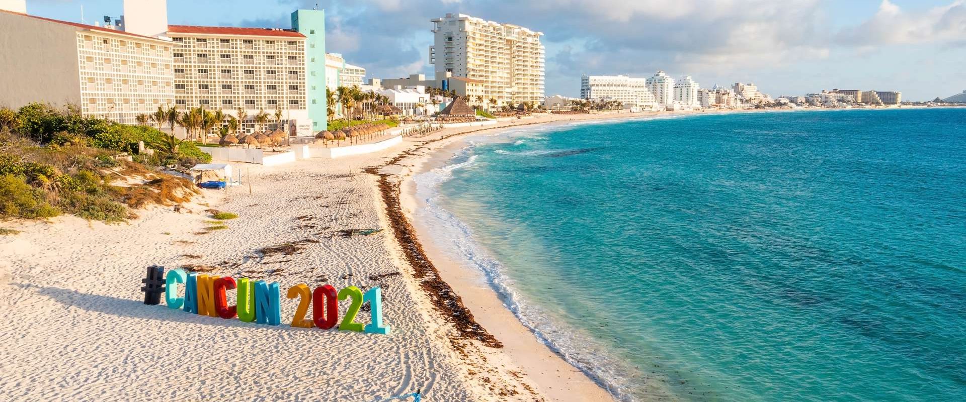 Cancun, Mexico. May 19, 2021. View of the Cancun 2021 sign on the beach in Cancun in Mexico. Cancun sign hashtag.